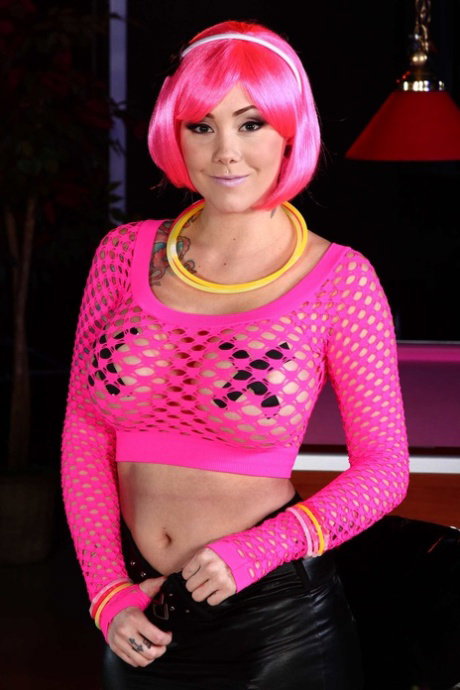 Hot babe Ashton Pierce with pink hair in pink stockings shows her ass and tits