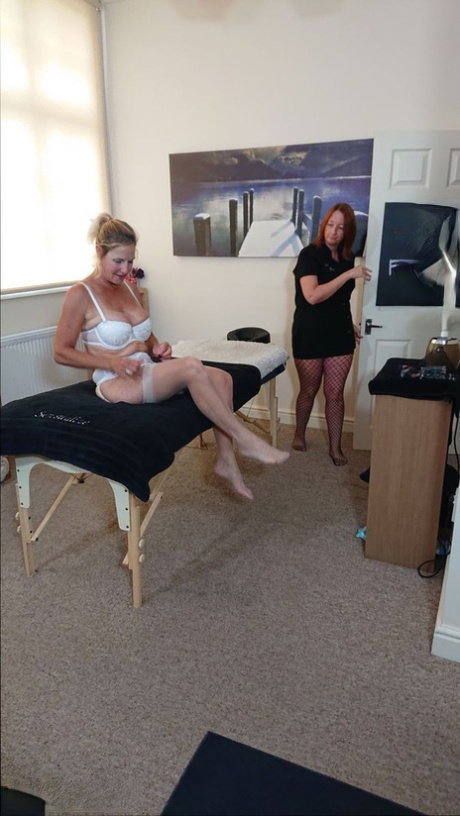 Older blonde Molly MILF has her pussy toyed by a red headed masseuse