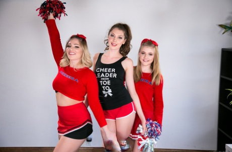 3 cheerleaders discovers the joys of lesbian sex on a white couch