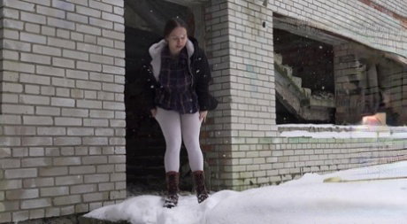 Jessica Stone gets caught with her leggings down while peeing on the snow