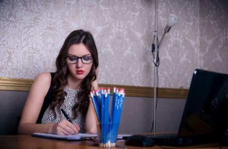 Horny teen Rebeka Ruby sticks a wad of pencils up her pussy and asshole