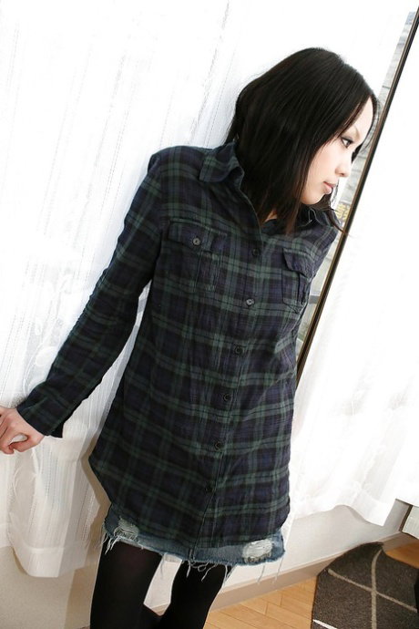 Foxy asian teen Saki Masuda undressing and spreading her legs
