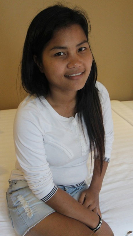 Chubby Asian girl Shanti undresses before bareback sex with a foreigner