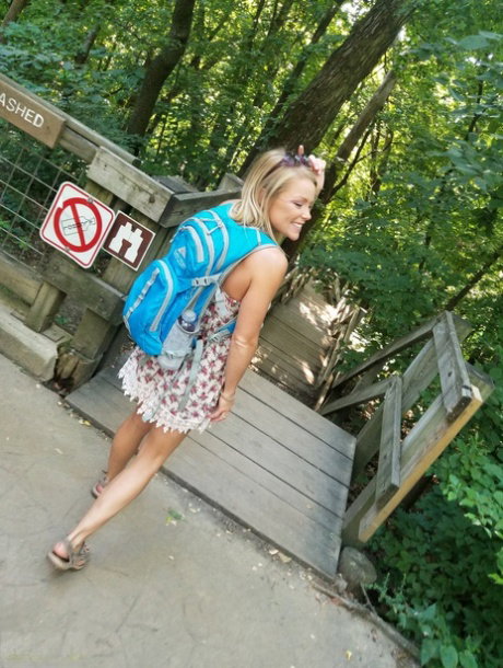 Blond amateur Meet Madden strikes hot solo poses in a bikini after backpacking