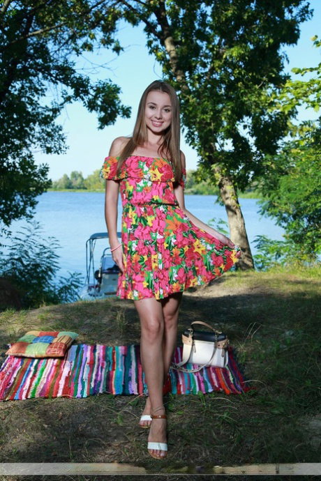Suite girl Linda A discards a summer dress to get butt naked near the water