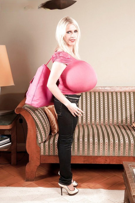Mature blonde in tight jeans Beshine showing her extremely huge juggs