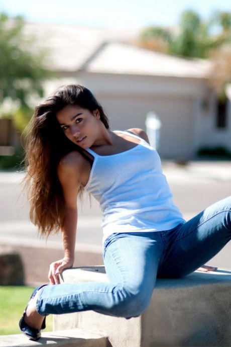 Young Latina Alexandria spreads her legs to toy her hot pussy on the sidewalk