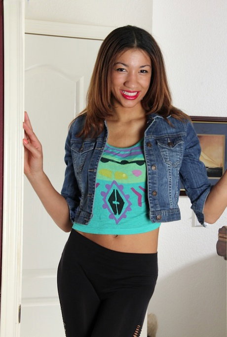 Adorable ebony amateur teen Jade undressing her awesome tits and ass