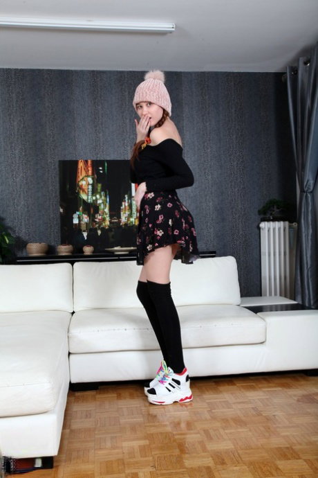 Beautiful Russian girl Gisha Forza strips & spreads her shaved pink pussy
