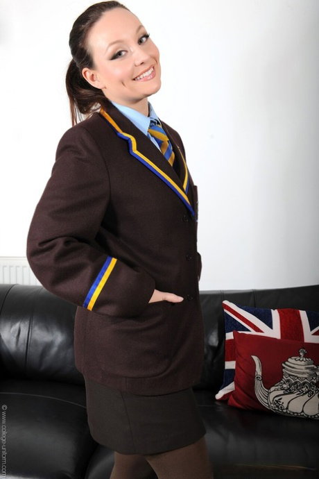 Brunette coed Carla Brown releases her big natural tits from her uniform