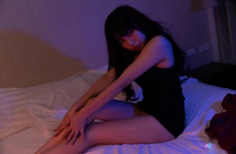 Sweet Chinese girl Ranako takes a cumshot on her small tits after fucking