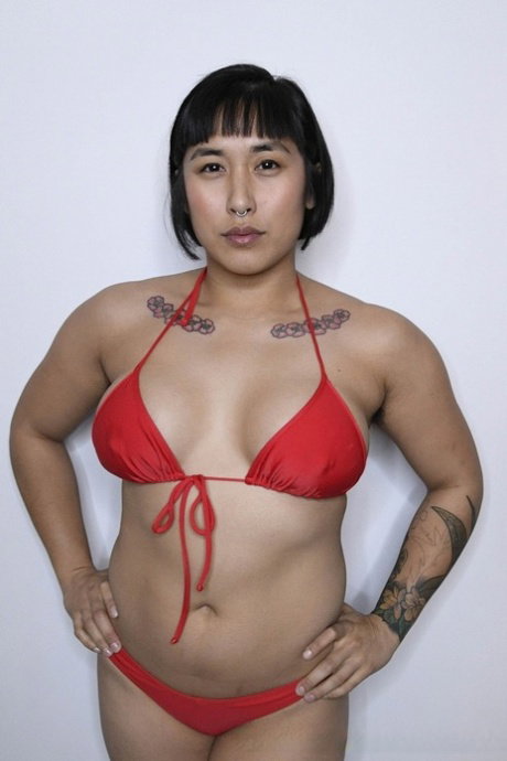 Asian femdom Mia Little has strapon anal sex with a man while wrestling him