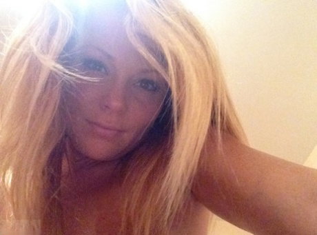 Blonde amateur Meet Madden slips a hand down her panties during SFW action