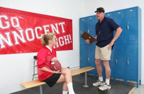 Cute blonde football fan Ruby Ryder fucks the coach for a spot on the team