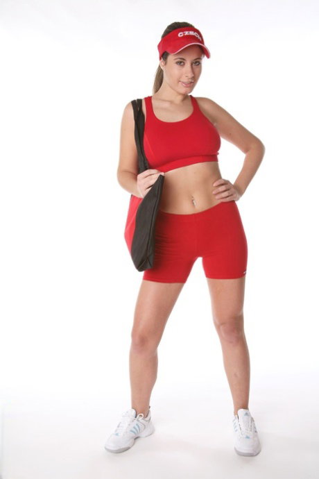 Sporty girl Elya doffs spandex wear to model naked in a visor
