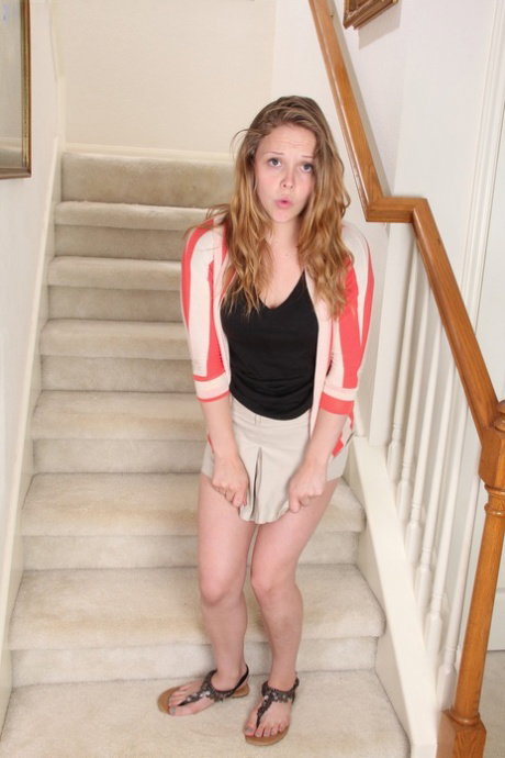 Amateur teen Sophia Monore shows her tiny tits and spreads her muff