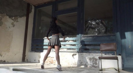 Flexible girl Gypsy Queen does the splits while taking a piss
