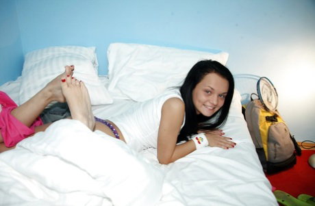 Tempting brunette teen girl Casey F posing and toying her poon