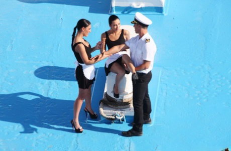 Romanian maids Abelia and Honey Demon get double fucked by captains on a boat