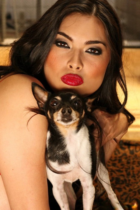 Famous pornstar MILF Tera Patrick in stockings and heels showing big tits