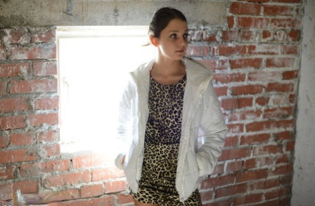 Young first timer Nensi gets nude in hightop runners inside a condo renovation