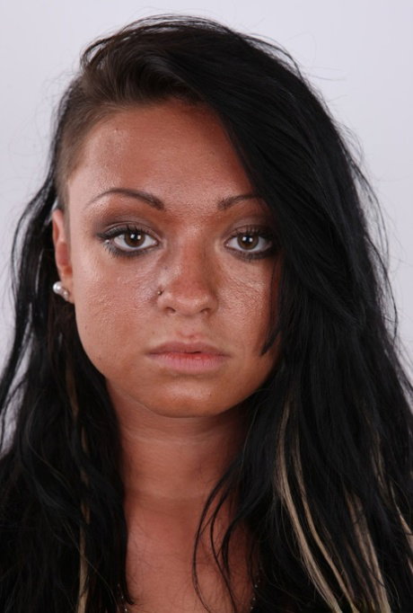 First timer Svetlana wears a sad face while stripping to her black underwear