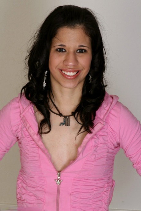 Cute brunette teen uncovers her natural tits before showing her bush