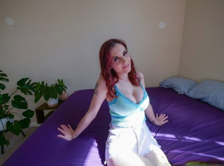 Redhead Lilian Stone engages in POV sex with a large cock