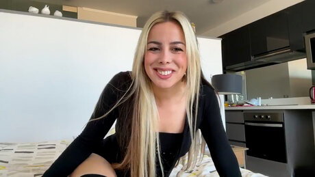 Horny beauty Linzi strips, unveils her big ass and masturbates in a solo
