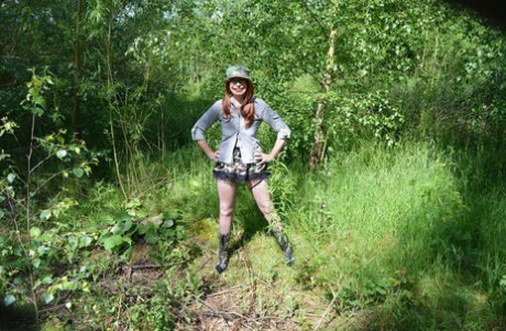 Busty amateur Barby Slut exposes her pussy during a walk in nature