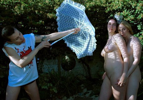 Violetta Storm and girlfriends have interracial fun while being photographed