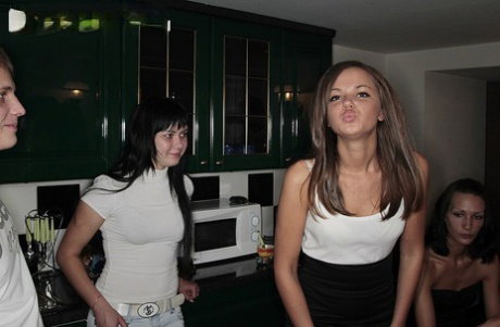 College girls participate in group sex during the course of a house party