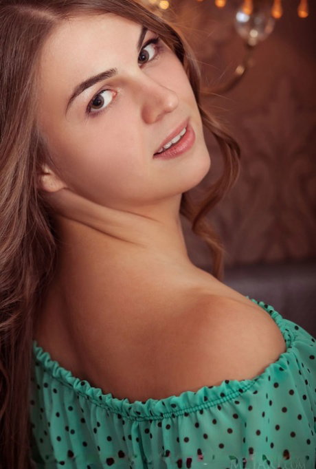 Beautiful teen Bella Libre puts her hot body on display without any clothes on
