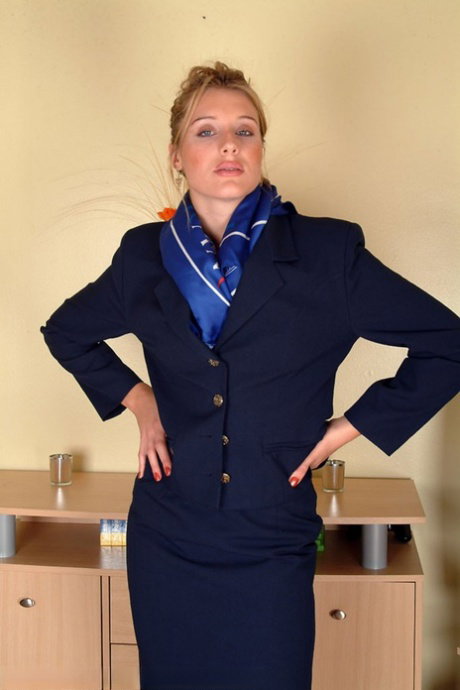 Sexy stewardess Angelina loses her uniform and spreads her hairy vagina