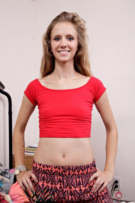 Cute blonde teen Rachel James exposes her skinny body and inviting pussy