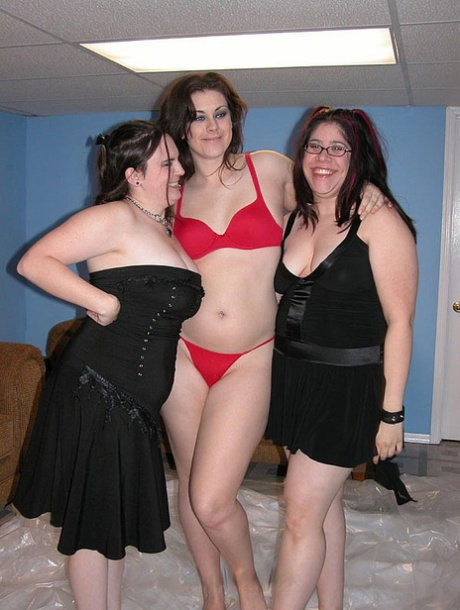 Three chubby amateurs undress and oil each other's big tits and fat ass