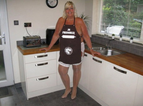 Middle-age blonde plumper Chrissy Uk covers her mostly naked body in batter