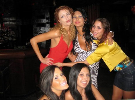 Group of young girls at a party suck and jerk off a solitary cock
