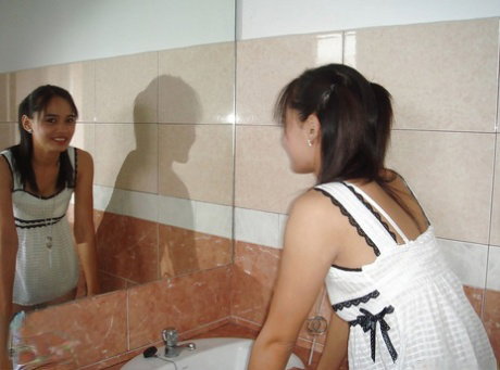 Sexy Thai teen shows off young girl body after getting nude in bathroom