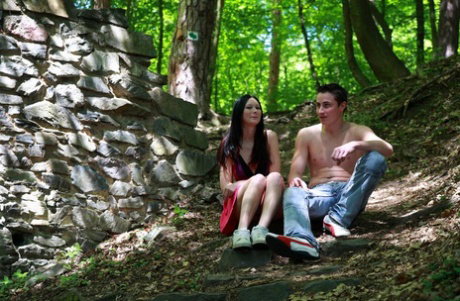 Dark haired teen receives a money shot after outdoor fucking