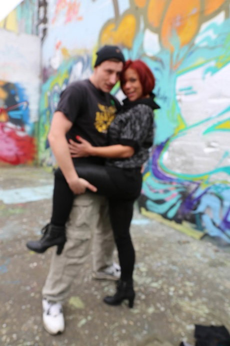 Kinky German MILF Jolyne Joy gets her big tits massaged by a photographer