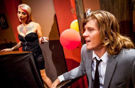 Tattooed girls treat a birthday boy to a three-way fuck after dining