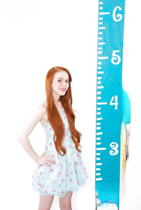 Redheaded teen solo girl Dolly Little spreading pussy after panty removal