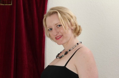 Horny Anya Volcov loves to play with her mature body and hairy pussy