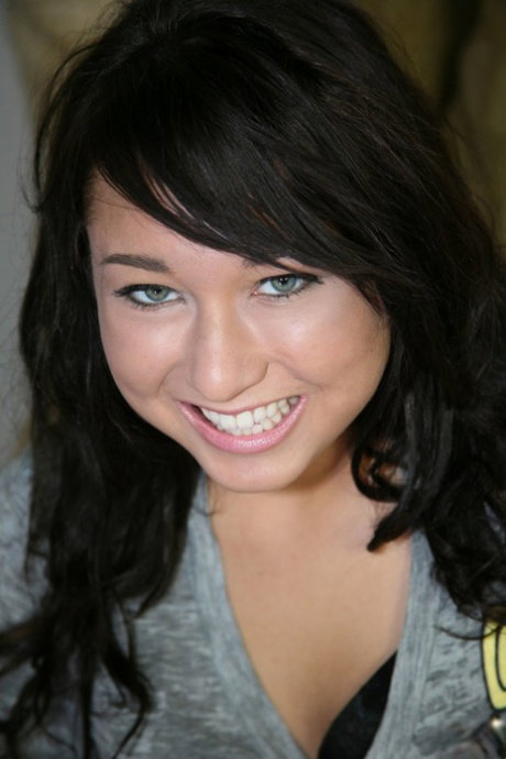 Cute brunette Jesse Jordan strips naked before lubing up for a POV handjob
