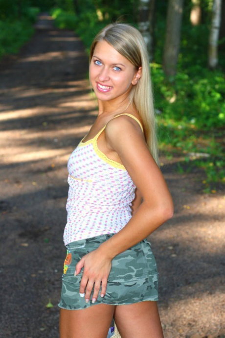 Hot teen amateur Riana unveils her juggs and ass and toys herself outdoors