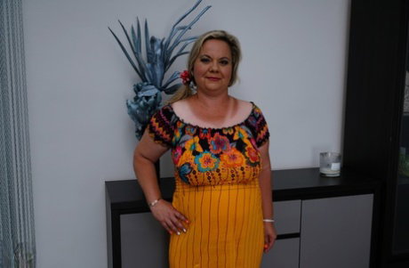 Obese older woman gets banged doggystyle on a sofa by her toy boy