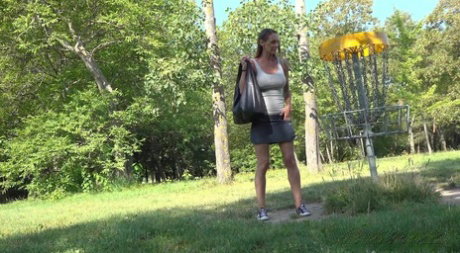 Short taken girl Cynthia Vellons takes a piss in an open field