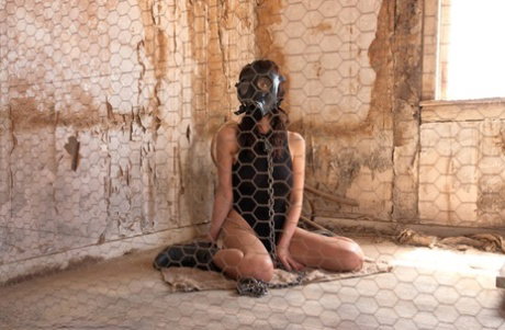 Female slaves are forced into sex acts in a desolate location