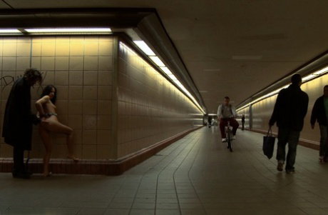 Amabella is penetrated while being held captive in a public place